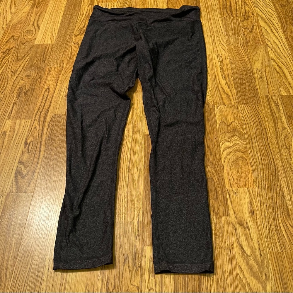 Dark grey Leggings. Size large. With hem pocket
